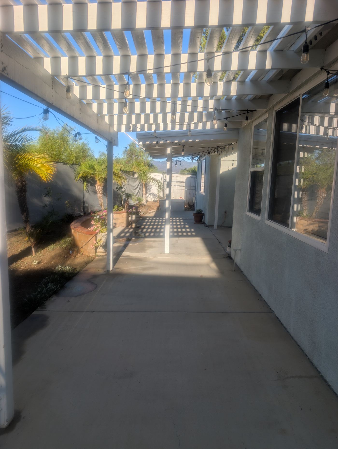 Pergola & String Lights — Soleil Levant Care