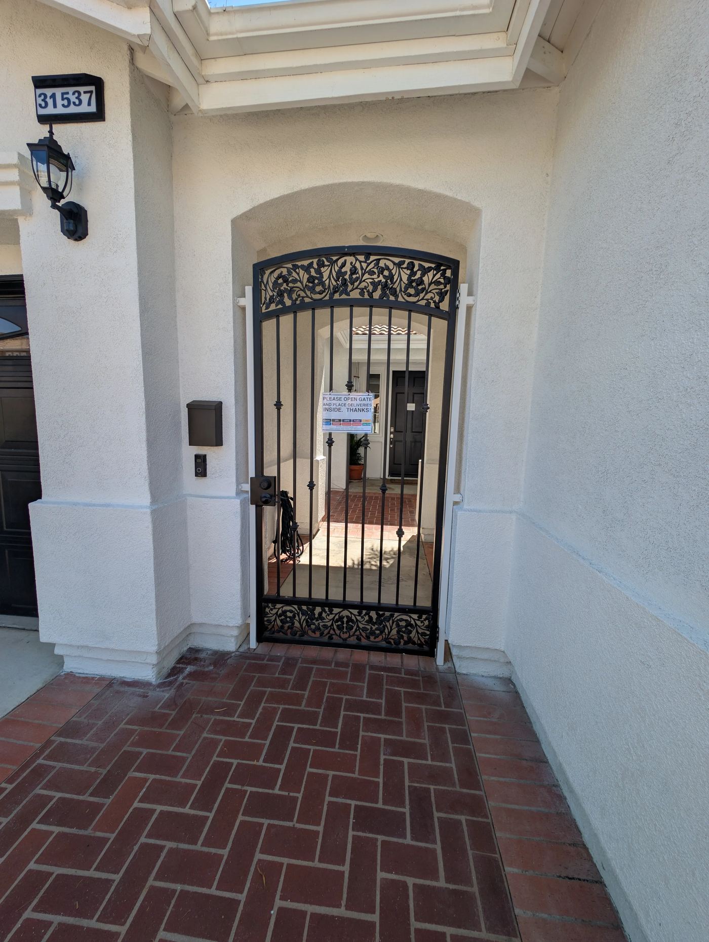 Front entrance gate at Soleil Levant Care, 31537 Canyon View Drive, Lake Elsinore CA