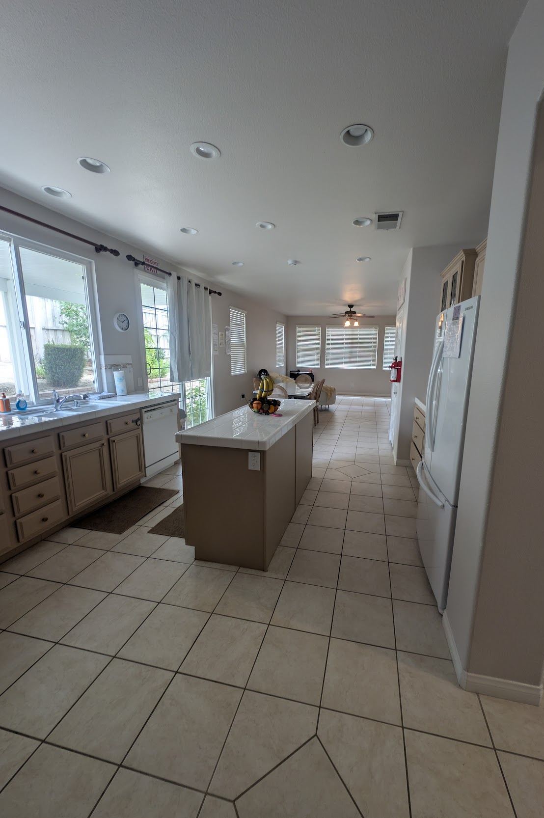 View from garage entrance into kitchen and dining room — Soleil Levant Care
